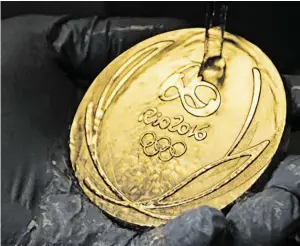  ?? BILD: SN/AFP ?? Medaillen in Rio bleiben für Russland das Objekt der Begierde.
