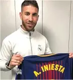  ?? DAILY MAIL ?? KADO BUAT RIVAL: Sergio Ramos memamerkan kostum pemberian Andres Iniesta setelah El Clasico (7/5).