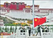  ?? REUTERS ?? A file photo of the Chinese national flag being raised during a ceremony at Potala Palace in Lhasa, Tibet.