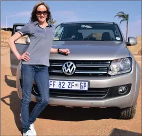  ??  ?? Tarryn Knight stands as tall as the VW Amarok in a male-dominated space.