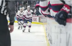  ?? BRANDON HARDER ?? The Regina Pats celebrate a goal by Josh Mahura, front, on Saturday against the Prince Albert Raiders.