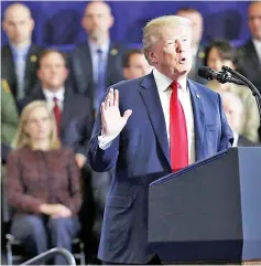  ??  ?? Trump speaks to supporters and local politician­s at an event at Manchester Community College in Manchester, New Hampshire. — AFP photo