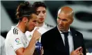  ??  ?? Real Madrid’s Gareth Bale (left) with the coach Zinedine Zidane during a drinks break in the game against Real Mallorca n June. Photograph: Susana Vera/Reuters