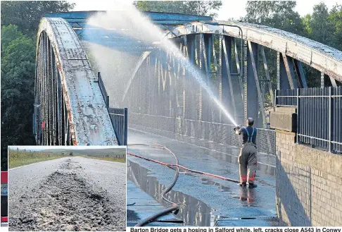  ?? Pictures: PAUL COUSANS ?? Barton Bridge gets a hosing in Salford while, left, cracks close A543 in Conwy