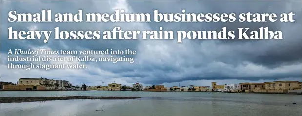  ?? MUHAMMAD SAJJAD / KHALEEJ TIMES ?? Following torrential rain, a residentia­l area of Kalba turned into a pond. Devastated by the damage caused by heavy rain in their area, residents are grappling with the situation.