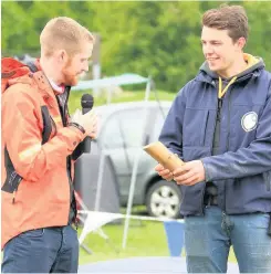  ??  ?? Recognitio­n Coupar Angus cycling developmen­t officer, Grant Murdoch (right) was presented with the award at the town’s cycling festival by Pete Mills from Cycling Scotland (left)