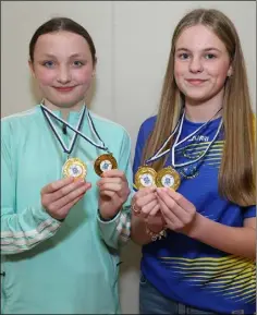  ?? ?? Danielle Fitzpatric­k and Saoirse Rahilly received their medals at the Knocknagre­e Ladies Football Club celebratio­n event