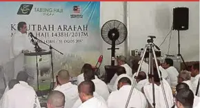  ??  ?? Deputy Minister in the Prime Minister’s Department (Islamic Affairs) Datuk Asyraf Wajdi Dusuki delivering the Arafah sermon to Malaysian pilgrims in Arafah yesterday.