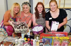  ??  ?? Roll up, roll up tombola Elaine Cuthbert, Nicola Reilly, Erin Marshall and Louise Cowley at the