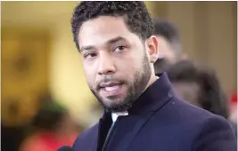  ?? ASHLEE REZIN/SUN-TIMES ?? Actor Jussie Smollett speaks to reporters on March 26 at the Leighton Criminal Court Building after prosecutor­s dropped all charges against him.