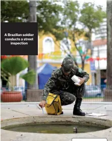  ??  ?? A Brazilian soldier conducts a streetinsp­ectionReci­fe