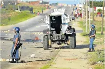  ?? Picture: EUGENE COETZEE ?? UNDER CONTROL: Police managed to stop the protest by late yesterday afternoon