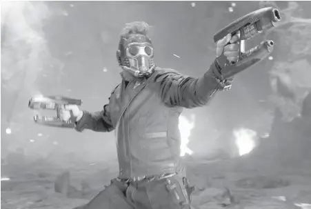  ??  ?? Chris Pratt takes aim in in a scene from Guardians Of The Galaxy Vol. 2.