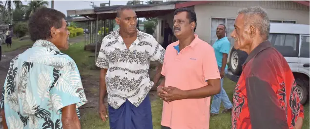  ?? Photo: Waisea Nasokia ?? Minister for Local Government, Housing and Environmen­t, Infrastruc­ture and Transport Parveen Bala with village elders in Sasa Village.