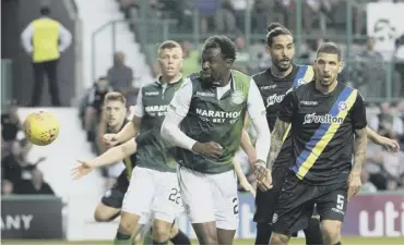  ??  ?? 0 Efe Ambrose brought Hibs back in to the tie with a scrambled goal from a corner kick.