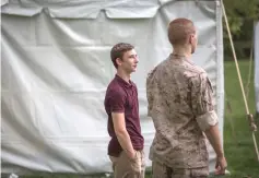  ?? —The Washington Post photos by Dayna Smith ?? Joshua Dias waits before performing as a young Colin Wolfe in a ballet the fallen Marine’s mother created after his death.