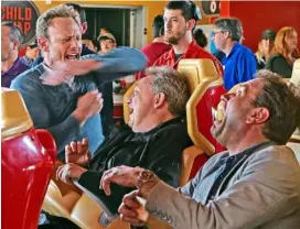  ??  ?? actor Ziering (left) has some fun with German comedians Oliver Kalkofe (centre) and Peter rutten, playing extras, during filming of Sharknado3. Photo: TNS