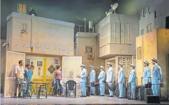  ?? St. Paul Pioneer Press ?? A touring cast of “The Band’s Visit.” David Yazbek’s urgent, exquisite score, with its lean song forms and its Israeli and Arab soundscape, maintains its mystery over many listenings.