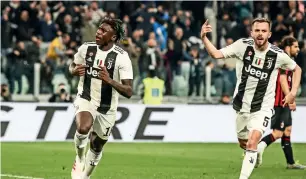  ?? AFP ?? Juventus’ Moise Kean (left) celebrates his goal with Miralem Pjanic. —