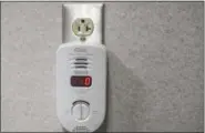  ?? ERIC BONZAR — THE MORNING JOURNAL ?? Bill Loomer, communicat­ions/community relations manager for Columbia Gas of Ohio’s northeast Ohio area, said carbon monoxide detectors should always be plugged into an electrical outlet.