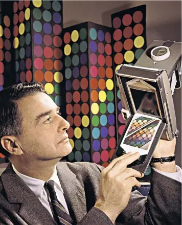  ??  ?? Polaroid founder Edwin Land, above, shows off its ‘60-second film’ back in 1963; right, Scott Hardy, Polaroid’s current chief demonstrat­es the company’s latest offering as it rides on a wave of enthusiasm for all things retro