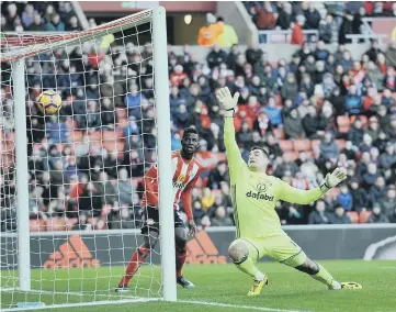  ??  ?? Vito Mannone can only watch in horror as Marko Arnautovic’s opening goal hits the back of the net (above), while Peter