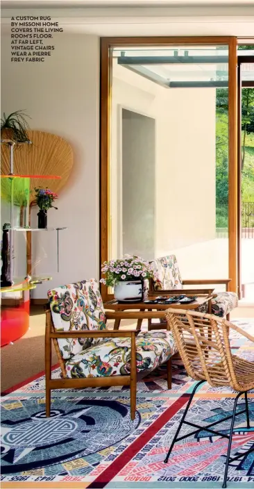  ??  ?? a custom rug By missoni home covers The living room’s floor. at far left, vintage chairs Wear a pierre frey fabric