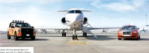  ??  ?? Jetex ferries passengers to their aircraft in a Rolls-Royce