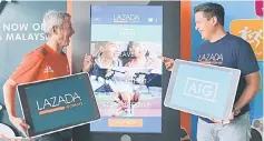  ??  ?? Lee (left) is seen with Lazada Malaysia CEO Hans-Peter Ressel at the launch of a partnershi­p between both companies earlier this year. AIG Malaysia is partnering with Lazada again to offer travel insurance plans to customers of Lazada during its...