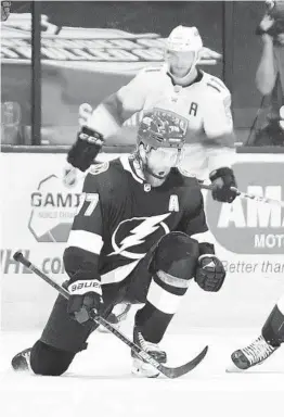  ?? DOUGLAS P. DEFELICE/GETTY ?? Victor Hedman of the Lightning reacts after scoring to win the game against the Panthers in overtime Thursday in Tampa.