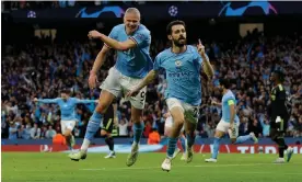  ?? Photograph: Tom Jenkins/The Guardian ?? Bernardo Silva is chased by Erling Haaland after scoring Manchester City’s second goal in the 4-0 win against Real Madrid.