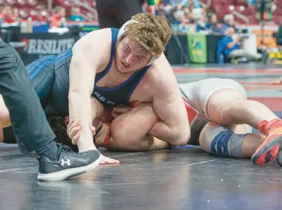  ?? DAVID GARRETT/SPECIAL TO THE MORNING CALL PHOTOS ?? Nazareth’s Sean Kinney beat Owen J. Robert’s Dean Bechtold on Saturday in the 285-pound, 3A state championsh­ip match at Giant Center in Hershey.