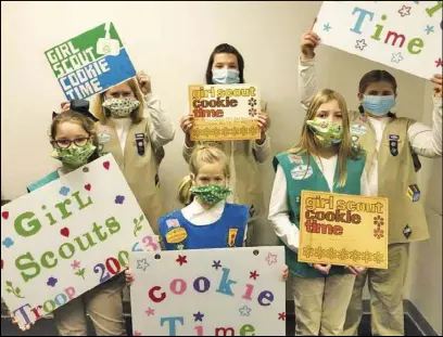  ??  ?? Girls Scouts, from left, front: Willough Huebner, Ava Bice, Emma Schoenlein; back: Emma Huebner, Emma Hunley and Taylor Lenhart are getting ready for the 2021 cookie sales.