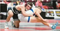  ?? FILE ?? Faith Christian Academy’s Gauge Botero, left, shown at an event in February, defeated Jackson Rush of West Perry, by technical foul, 18-3, to win the 121-pound title at the Southeast Regional Class 2A wrestling championsh­ips at Freedom Saturday.