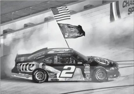  ?? WILFREDO LEE/ ASSOCIATED PRESS ?? Brad Keselowski celebrates after winning the NASCAR Sprint Cup Series title in the final race of 2012 at Homestead- Miami Speedway.