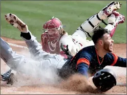  ??  ?? ABOVE LEFT: Arkansas’ Grant Koch tags Bucknell’s Evan Klugerman at home in Sunday’s 3-1 victory that gave the Razorbacks the series sweep at Baum Stadium in Fayettevil­le. The out prevented the Bison from going up 2-0 in the second inning. ABOVE RIGHT:...