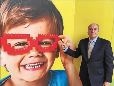  ?? GARY PULEO — DIGITAL FIRST MEDIA ?? PREIT CEO Joe Coradino stands by a partition that conceals constructi­on of Plymouth Meeting Mall’s Legoland Discovery Center Philadelph­ia, coming next spring.