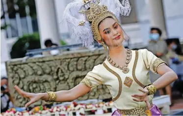  ?? | EPA ?? A DANCER performs during a ceremony to celebrate the return of two ancient sandstone carvings from the US that are believed to have been stolen from Thailand about 60 years ago at the National Museum in Bangkok, yesterday.