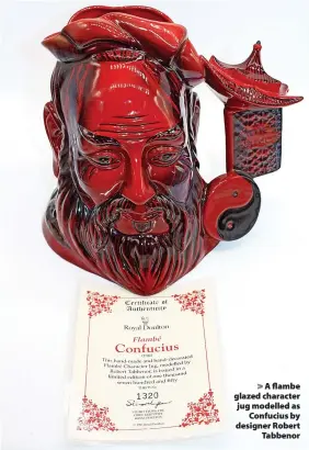  ??  ?? > A flambe glazed character jug modelled as Confucius by designer Robert Tabbenor