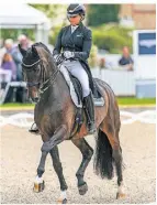  ?? FOTO: IMAGO ?? Dorothee Schneider mit ihrem Pferd Showtime beim Grand Prix.