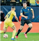  ?? ?? Stretched: Harry Maguire covers for United as Villarreal winger Yeremi Pino threatens