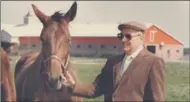  ?? TORONTO STAR FILE PHOTO ?? Charlie Armstrong is pictured holding Armbro Auriel at his 485-hectare Caledon farm in 1986.