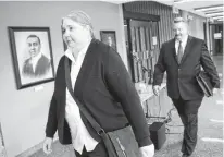  ?? TIM KROCHAK • THE CHRONICLE HERALD ?? Halifax Regional Police special constables Cheryl Gardner and Dan Fraser leave Supreme Court during a break at their jury trial on a charge of criminal negligence causing death in Halifax on Oct. 28. The jury was sequestere­d Friday night.