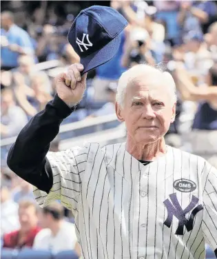  ?? PHOTO: REUTERS ?? Thank you, everyone . . . Hall of Fame member Whitey Ford tips his cap during introducti­ons for the New York Yankees’ 64th OldTimers’ Day game at Yankee Stadium in New York in 2010.