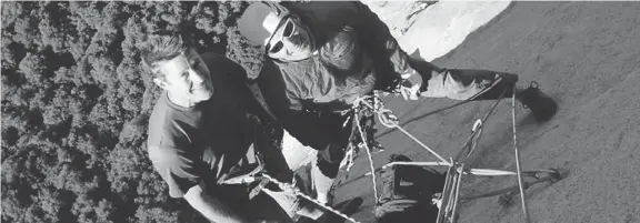  ?? GREG MURPHY VIA THE ASSOCIATED PRESS ?? Jason Wells, left, and Tim Klein pause during a 2017 climb along the Nose climbing route on El Capitan in Yosemite National Park. Family and friends say the two men, who fell about 1,000 feet to their deaths on Saturday, were elite climbers who had...