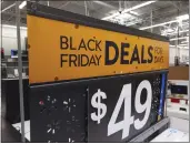  ?? MATT ROURKE — THE ASSOCIATED PRESS ?? A “Black Friday” sign is posted at a retail location Monday in Philadelph­ia.