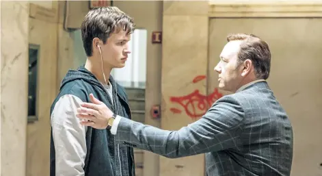  ?? SONY/TRISTAR VIA THE ASSOCIATED PRESS ?? Ansel Elgort, left, plays Baby and Kevin Spacey plays smooth-talking mastermind Doc in a scene from Baby Driver.