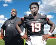  ?? [PHOTO BY SARAH PHIPPS, THE OKLAHOMAN] ?? Putnam City senior Collin Clay and his father, Rob, known as Big Rob on stage, started living together five years ago. They now share a special bond that has led to big things for Collin.