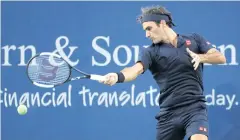  ?? AFP ?? Roger Federer returns a shot to Peter Gojowczyk.