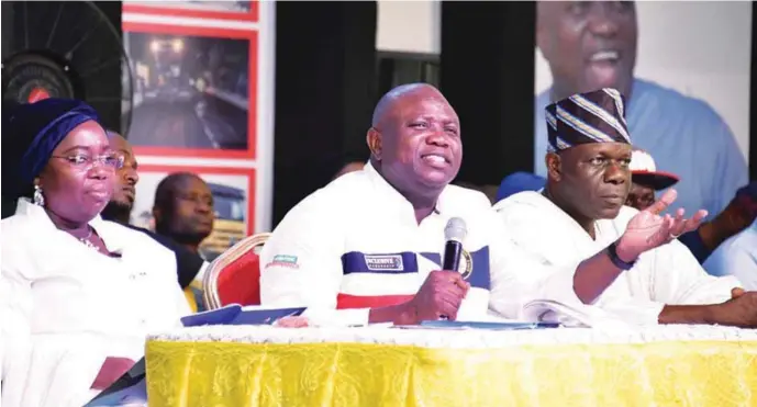  ??  ?? Lagos State Governor, Mr. Akinwunmi Ambode (middle); Deputy Governor, Dr. (Mrs) Oluranti Adebule (left) and State Chairman, All Progressiv­es Congress Lagos, Alhaji Tunde Balogun (right) during the third Quarter 2018 Town Hall meeting, at Community Primary School, Iberekodo, Ibeju-Lekki, ...recently